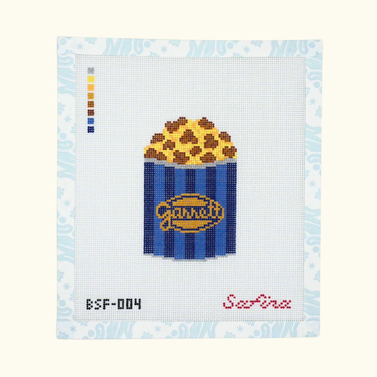 Caramel and cheese mix Chicago popcorn in blue striped tin needlepoint canvas design