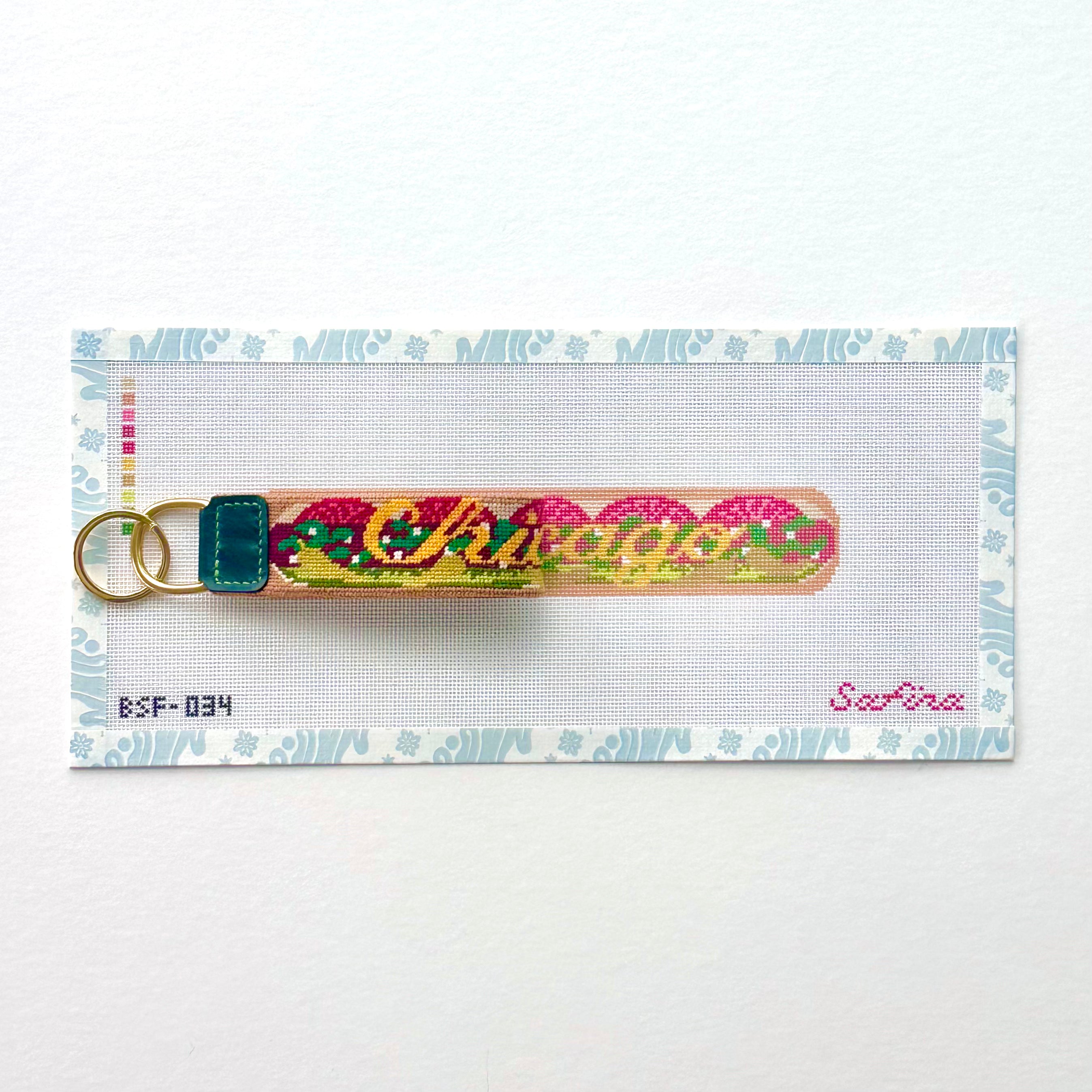 Needlepoint canvas and key fob of a colorful Chicago hot dog design