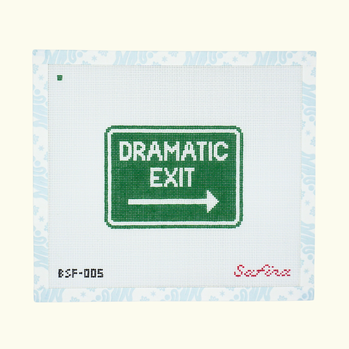 Green highway exit right sign with 'Dramatic Exit' text and arrow needlepoint canvas design