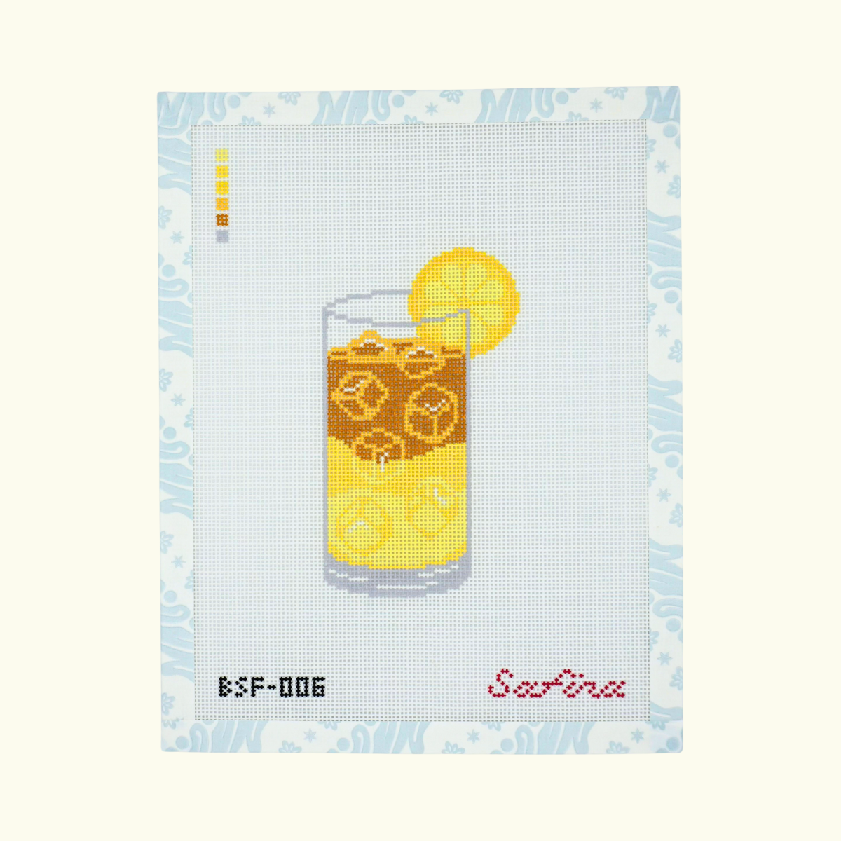 Lemonade iced tea in a glass with lemon slice needlepoint canvas